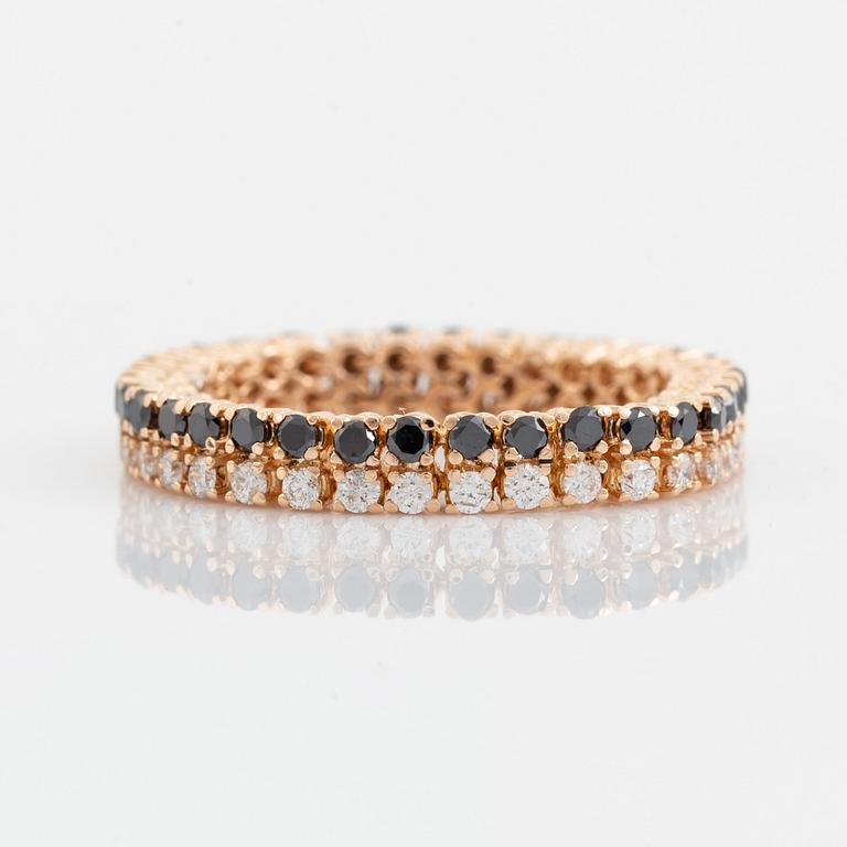 Black and colourless diamond ring.