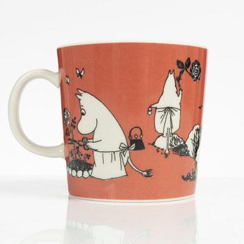 A Moomin mug, 'Dark rosa' with sticker, Arabia, Finland, 1991-99.