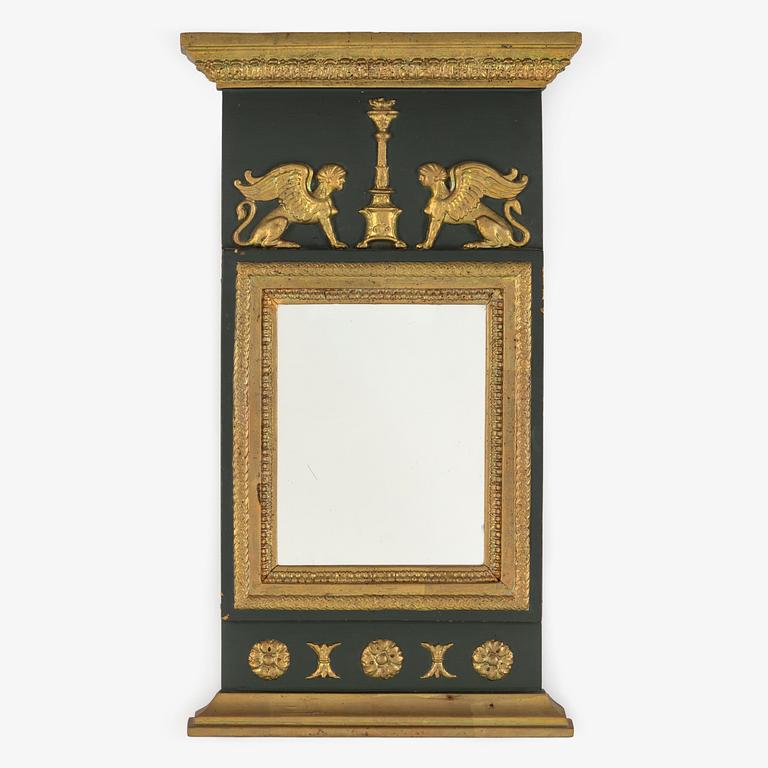 A first half of the 19th century empire mirror.