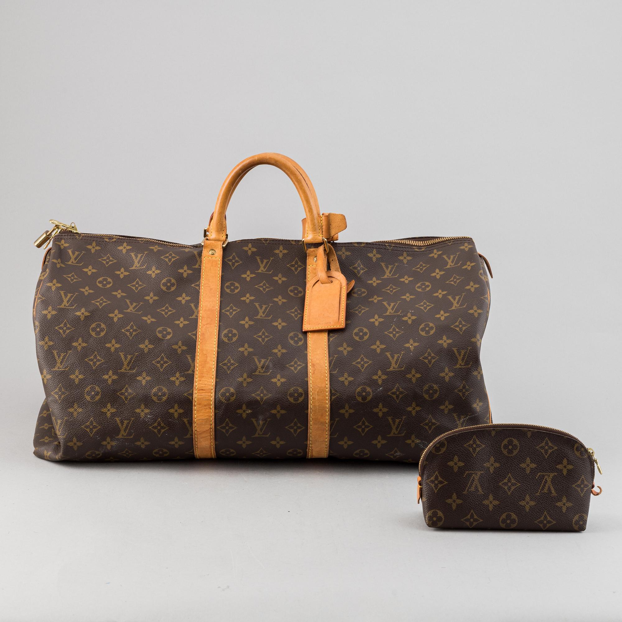 Louis Vuitton, a monogram canvas 'Keepall 55' weekend bag and toilet bag.