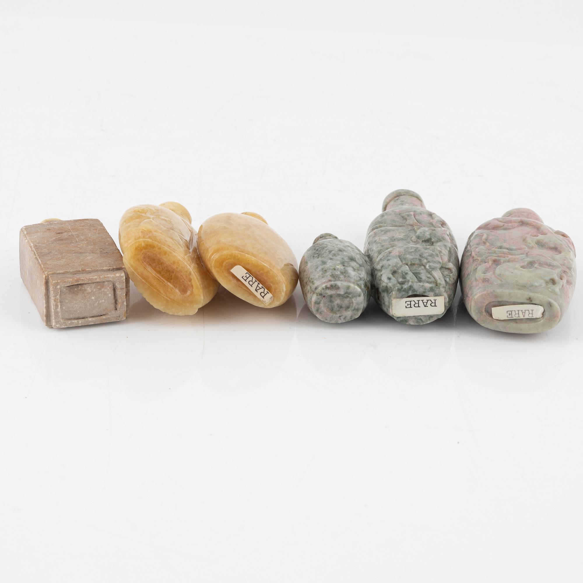 Eight snuff bottles, mottled stone, China, 20th century.