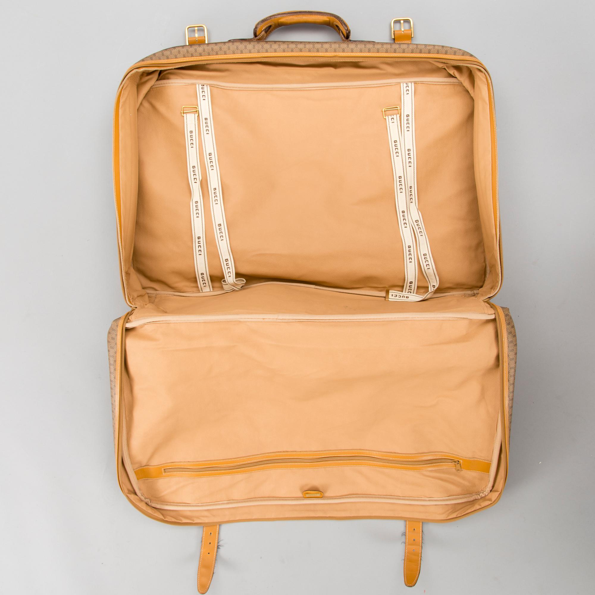 A Large Vintage Micro GG canvas Soft Suitcase.