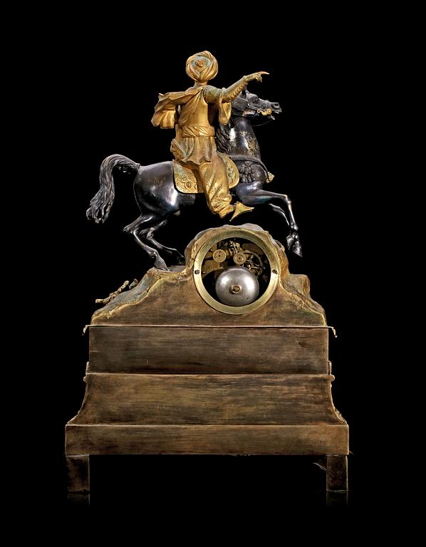 A French 1830/40's gilt and silvered bronze and brass mantel clock.