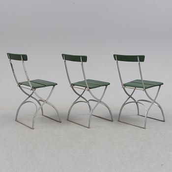 A garden table and four chairs, first half of the 20th century.