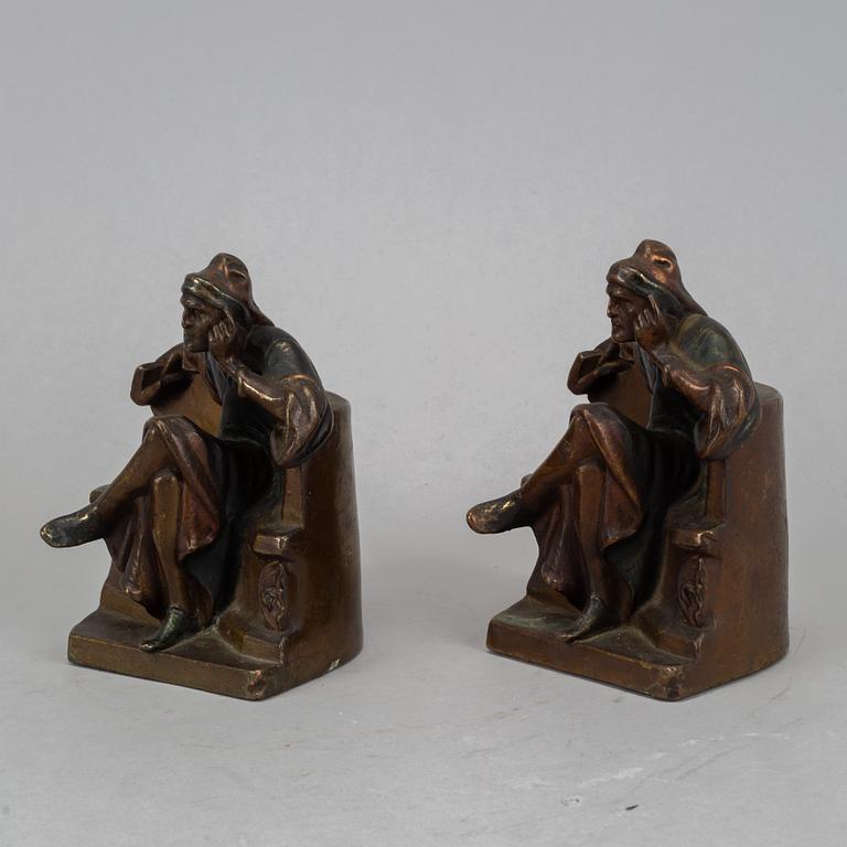 Two brass book ends, 20th century.