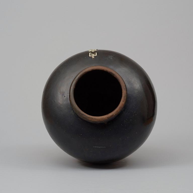 A Massive Imperial Black-glazed 'Neifu' stoneware storage jar, Ming dynasty (1368-1644).