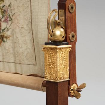 A French Empire early 19th century sewing stand.