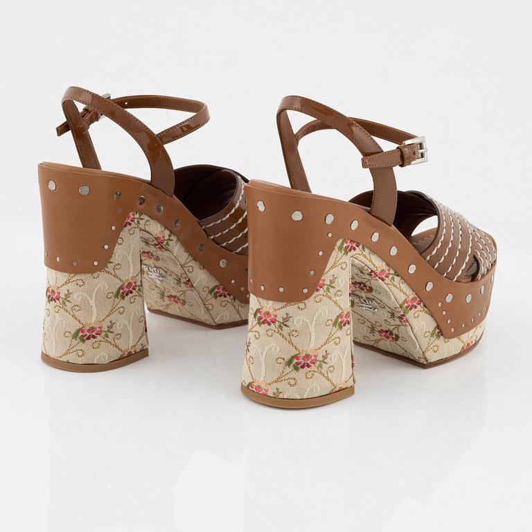 Prada, a pair of embroidered textile and leather sandals, size 37.