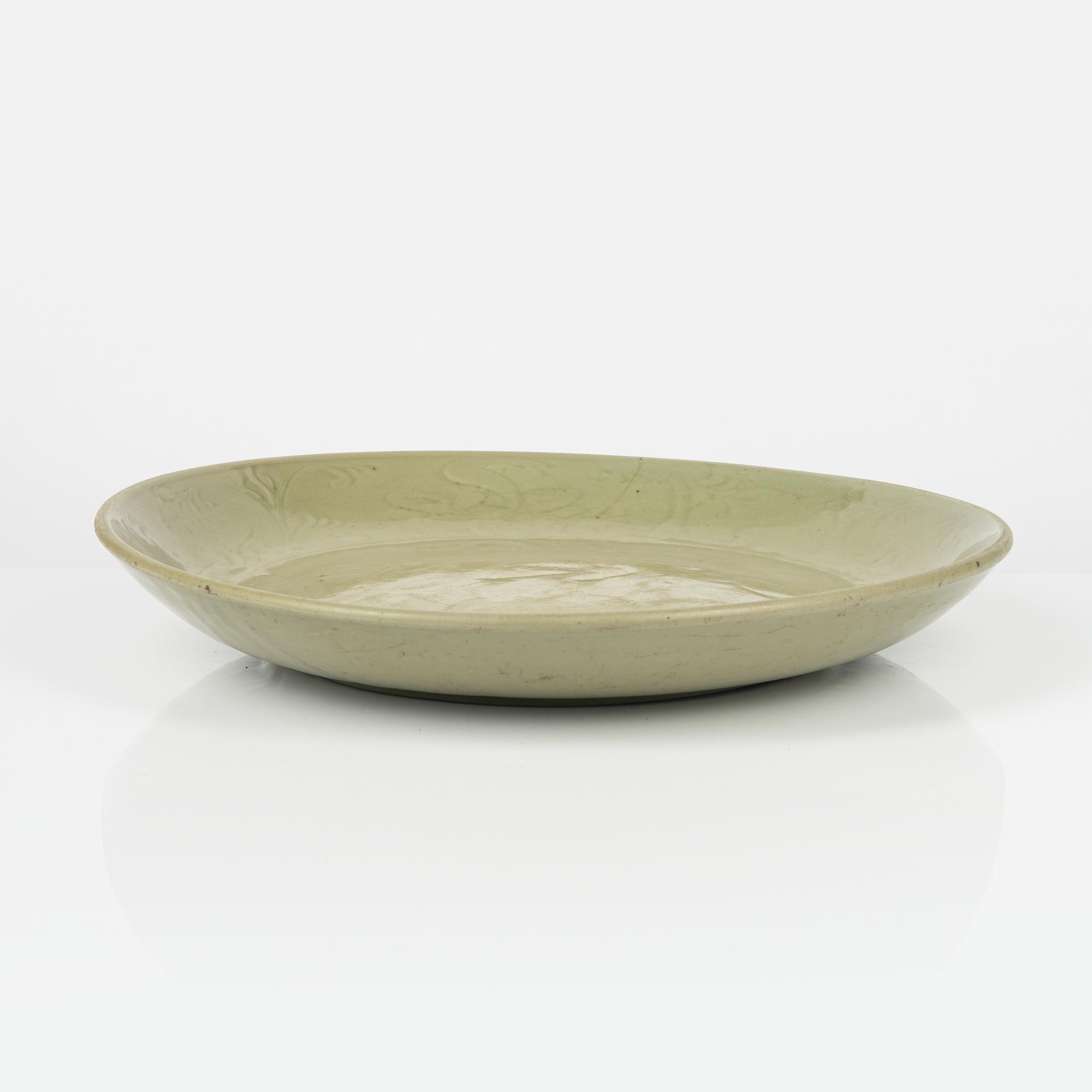 A celadon dish, Ming (1368-1644), for South East Asian market.