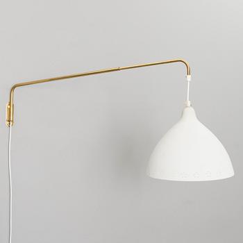 A mid 20th century wall light for Stockmann Orno.