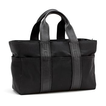 664. HERMÈS, a black nylon bag with leather details.