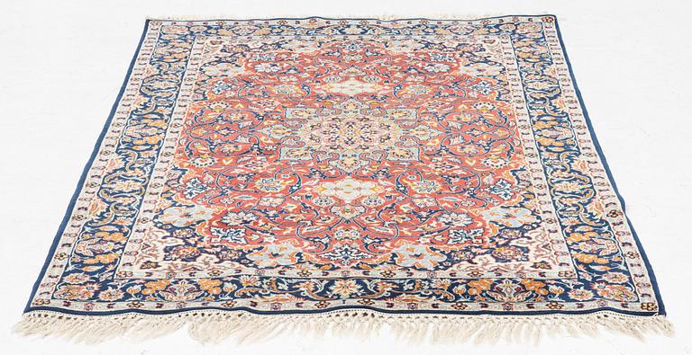 A rug, silk Quum presumably, c. 153 x 104 cm.