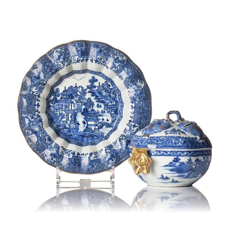 A Chinese blue and white 'pomegranate' tureen with cover and stand, Qing dynasty, Qianlong (1736-95).