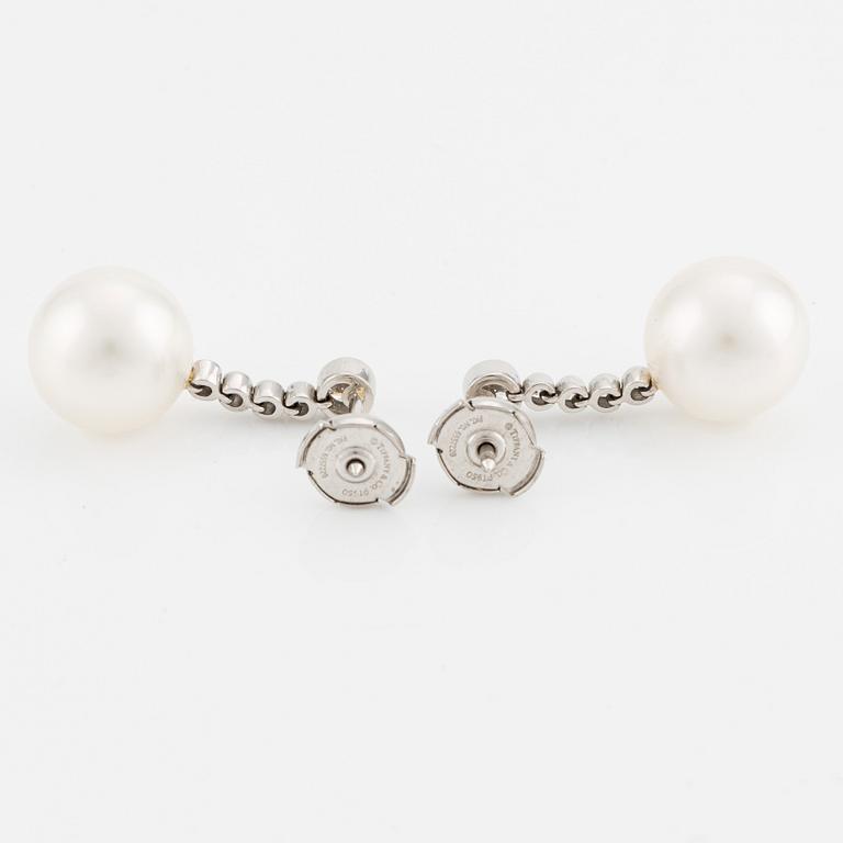 A pair of Tiffany & Co  platinum earrings with cultured pearls and round brilliant-cut diamonds.