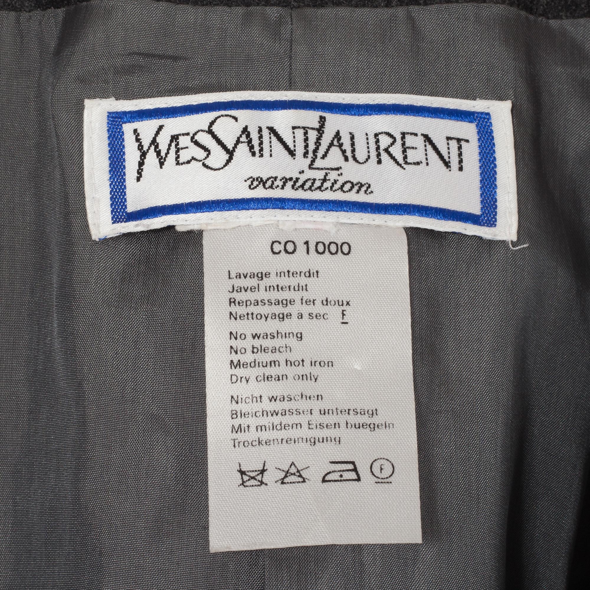 KAVAJ, Yves Saint Laurent.
