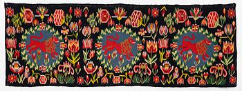 A carrige cushion, "Red Lion", tapestry weave, 140 x 50 cm, southwestern Skåne, early 20th century.