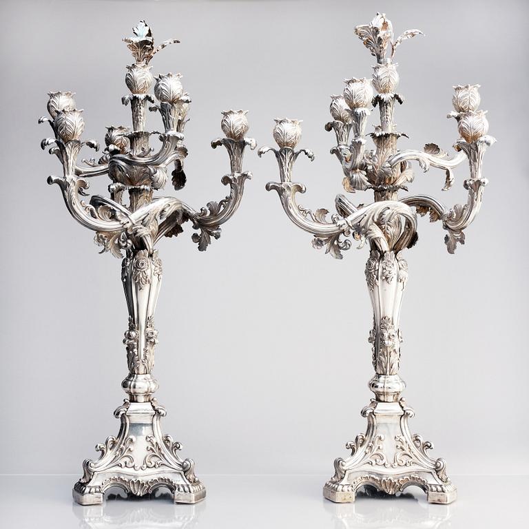 A pair of Swedish mid 19th century silver candelabra, marks of Gustaf Möllenborg, Stockholm 1844.