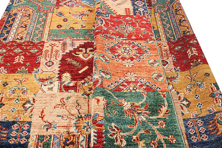 A Kazak carpet, c. 296 x 209 cm.