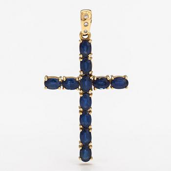 Kors, 18K guld och safirer och diamanter ca 0.035 ct tot.