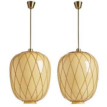 352. Harald Elof Notini, attributed to, a pair of vanilla coloured glass ceiling lights with fretted rattan, Böhlmarks, Stockholm 1940's.