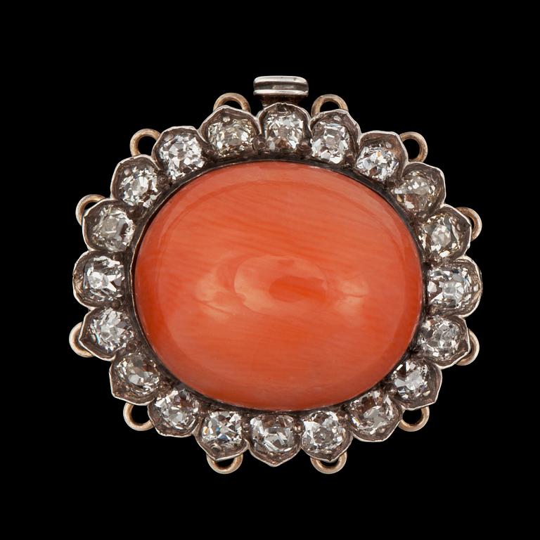 A coral and diamond clasp. Total carat weight of diamonds circa 1.20 cts. Made for a 6-strand pearl necklace.