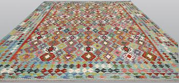 A Kilim carpet, approx. 400 x 309 cm.