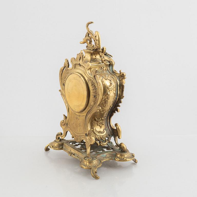 A Rococo Revival mantel clock, late 19th Century.