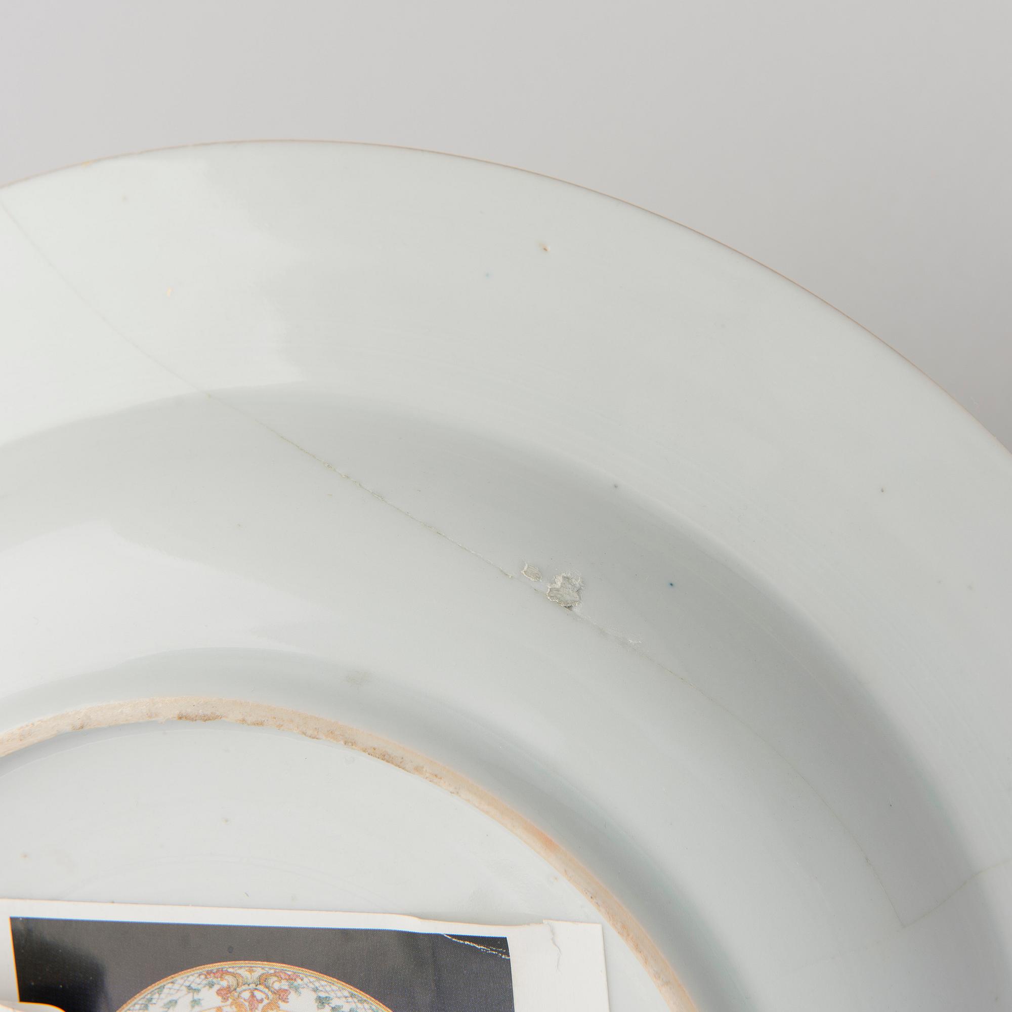 A CHINESE SOUP PLATE, amorial procelain. Qing dynasty, Qianlong (1736-95).