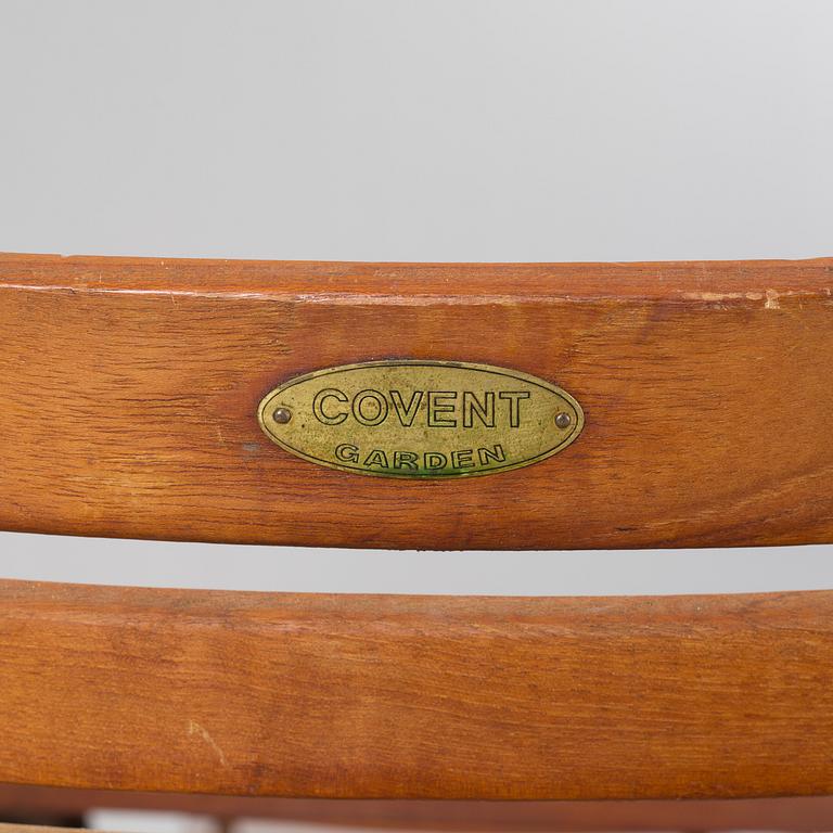 A garden table and four garden chairs from Covent Garden, 21th century.