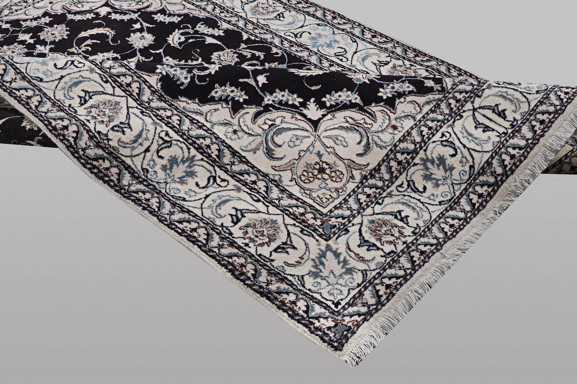 A carpet, Nain, part silk, ca 9 laa, ca 290 x 194 cm.