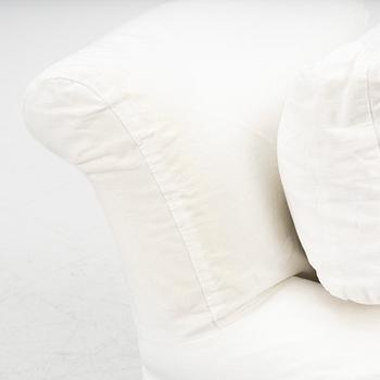 An armchair, contemporary.