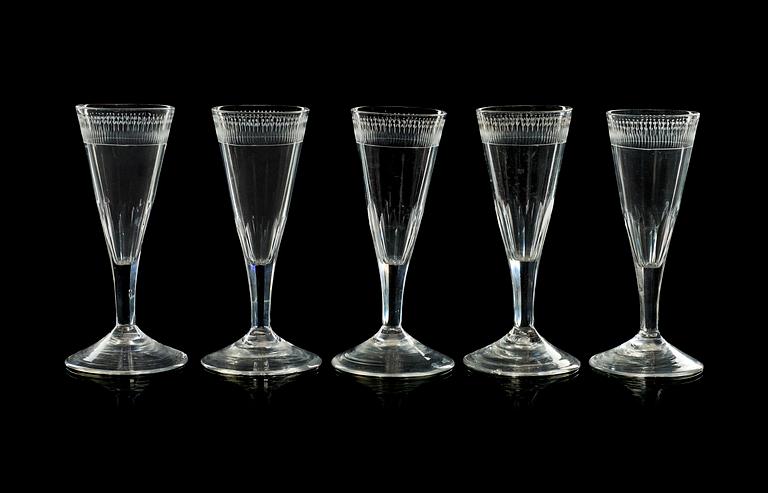 A set of five Champagne flutes, circa 1800.