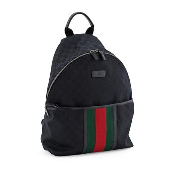GUCCI, a black monogramed canvas backpack.