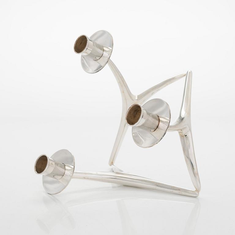 Anna-Greta Eker, a three-armed silver candelabrum, Auran Kultaseppä Oy, Turku, Finland 1967.