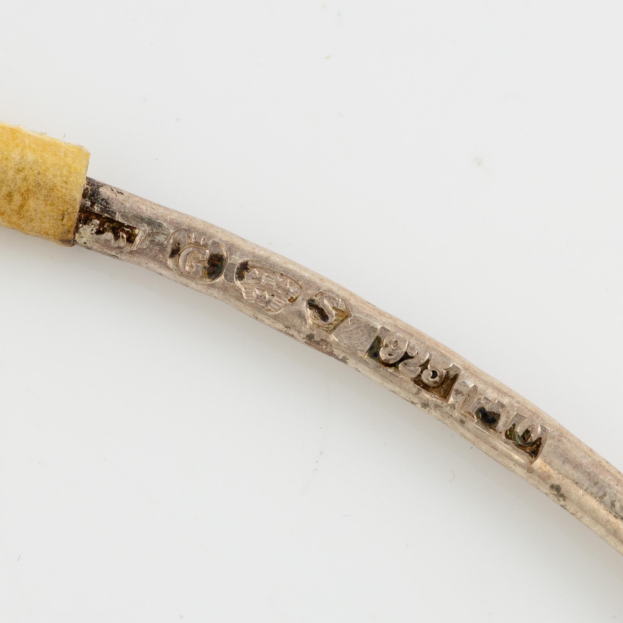 Lars Arby, three neck rings with pendants, silver, Gothenburg including 1977, 1978, and 1982.