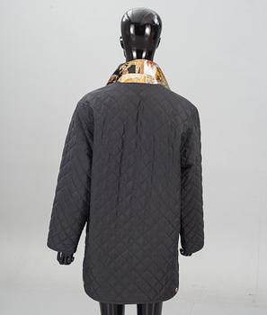 JACKA samt BLUS. Salvatore Ferragamo.