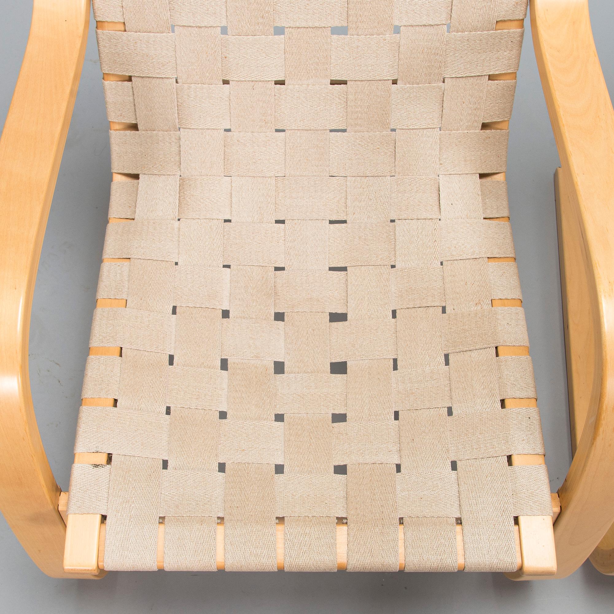 Alvar Aalto, a pair of late 1900s '406' armchairs for Artek.