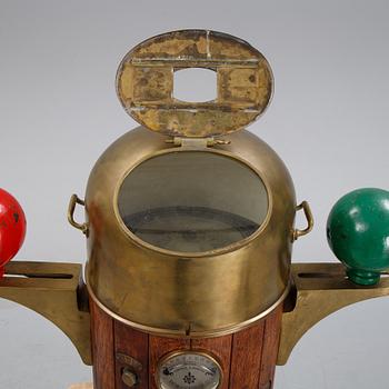 An oak and brass binnacle from Nunotani Keiki Seisakusho Ltd., mid 20th Century.