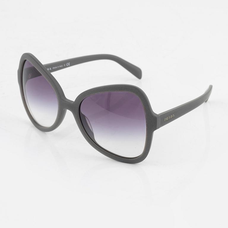 Prada, A pair of grey sunglasses.