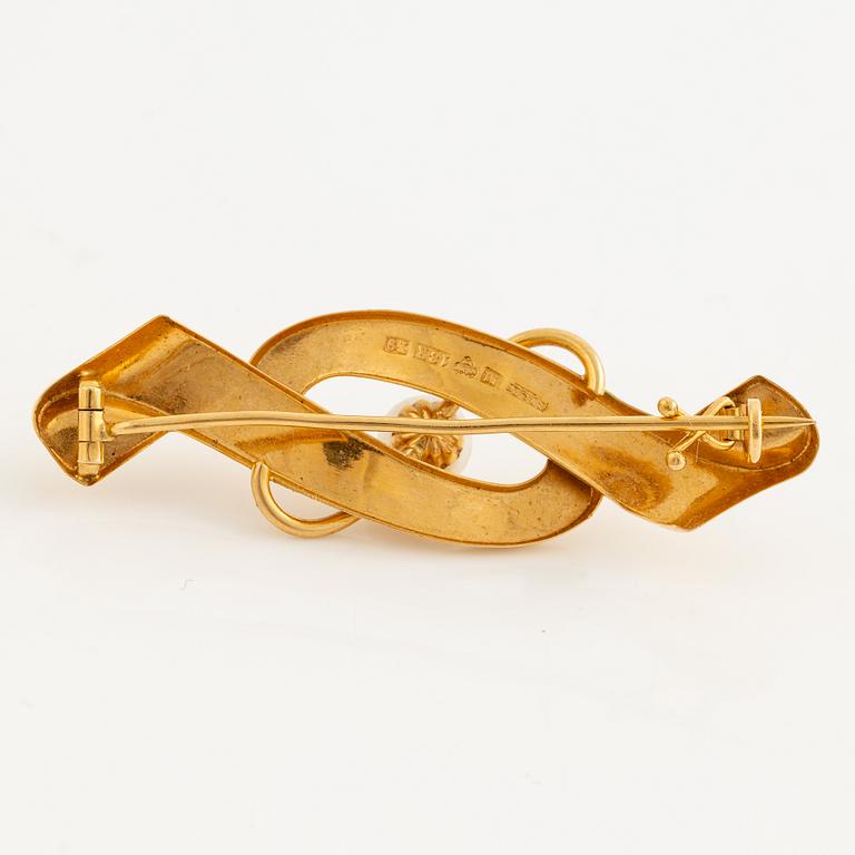Brooch 18K gold with a cultured pearl.