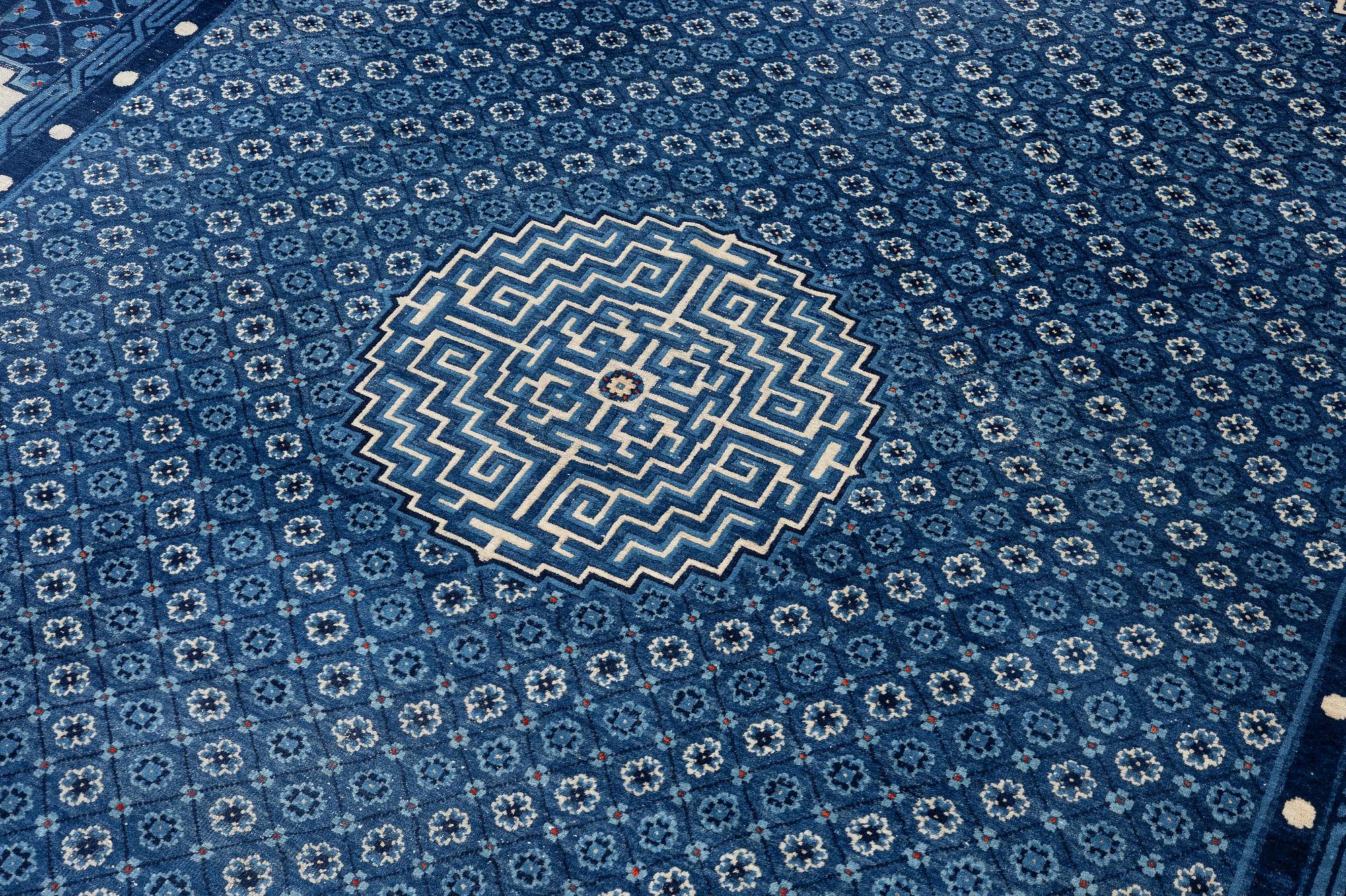 A semi-antique Baotou carpet, West China, c. 335 x 246 cm.