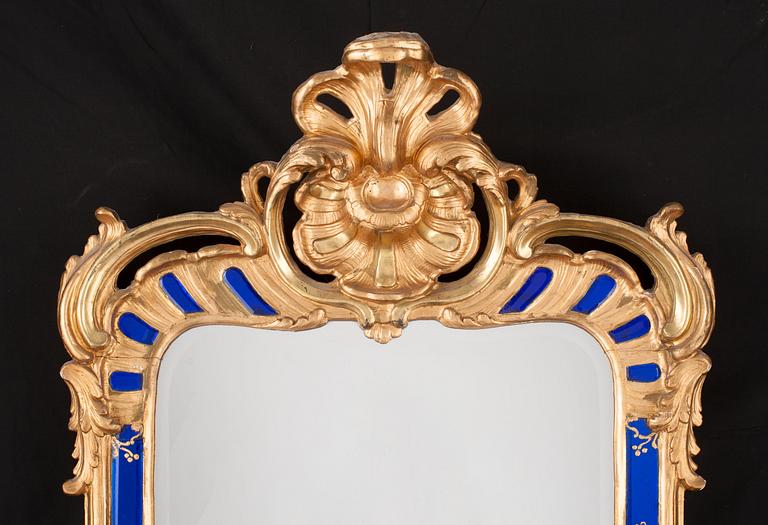 A pair of Swedish Rococo mirrors by E. Göbel dated 1760.