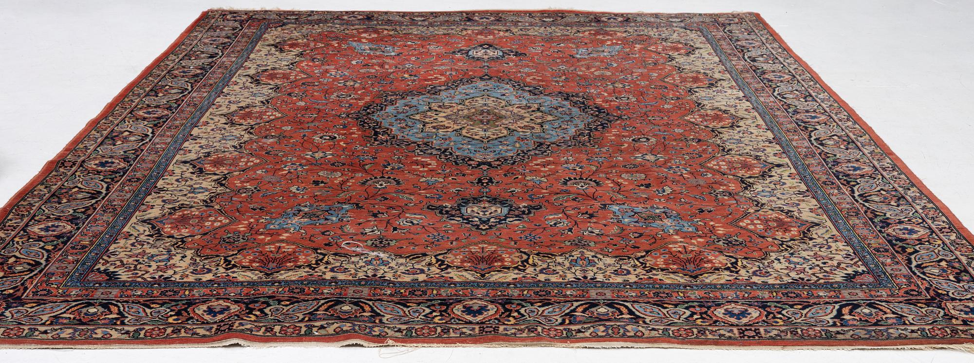 An oriental carpet, c. 370 x 275 cm.