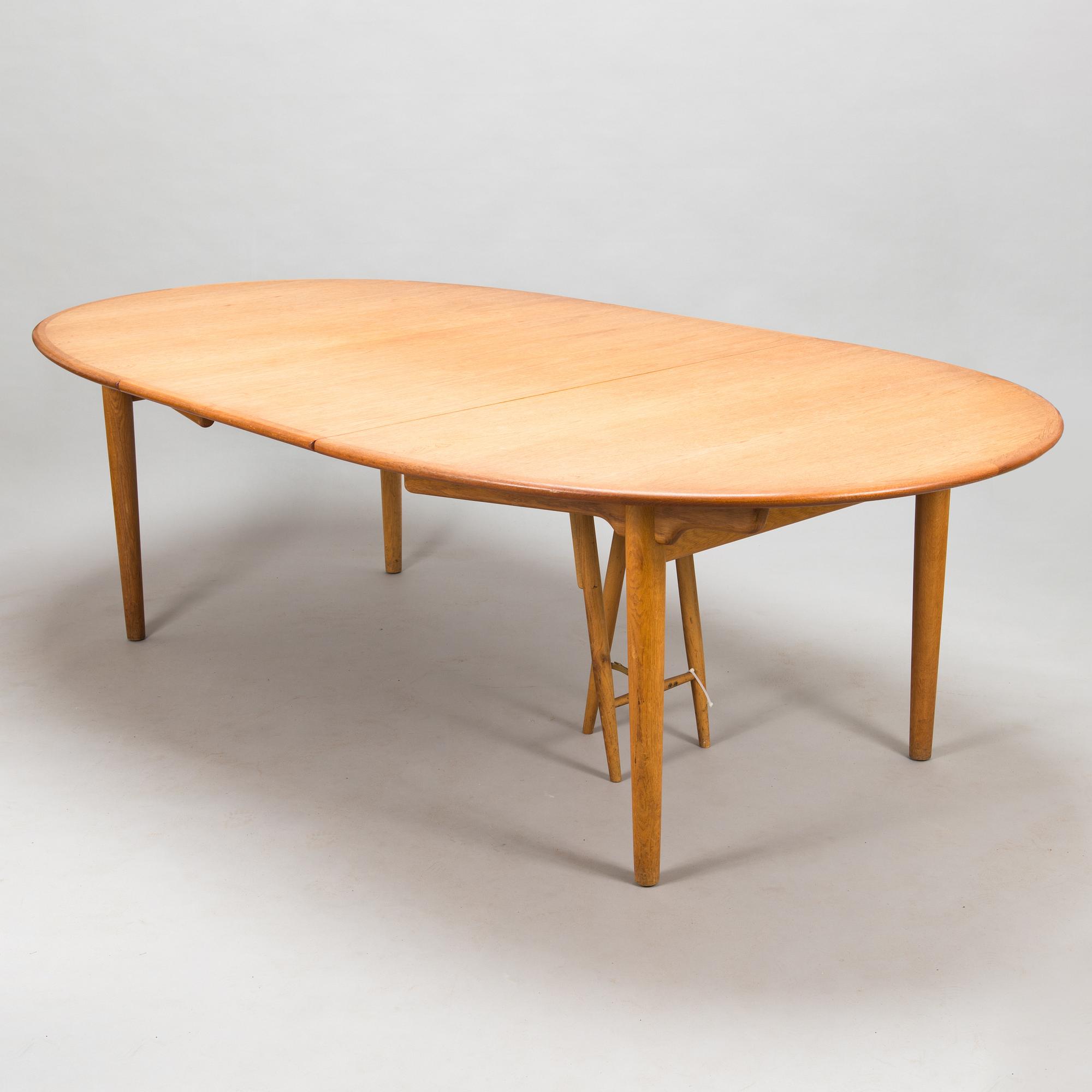 Hans J Wegner, A 1950s dining table model JH 567, Johannes Hansen, Denmark.