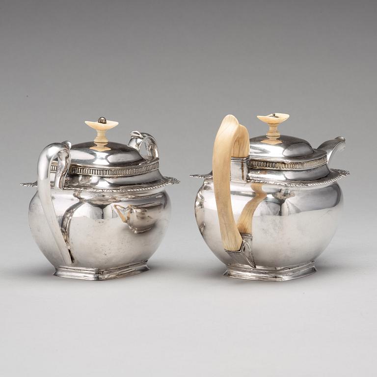 A Baltic 19th century parcel-gilt silver tea-pot and sugar casket, mark of Reinhold Eckert, Riga 1828.