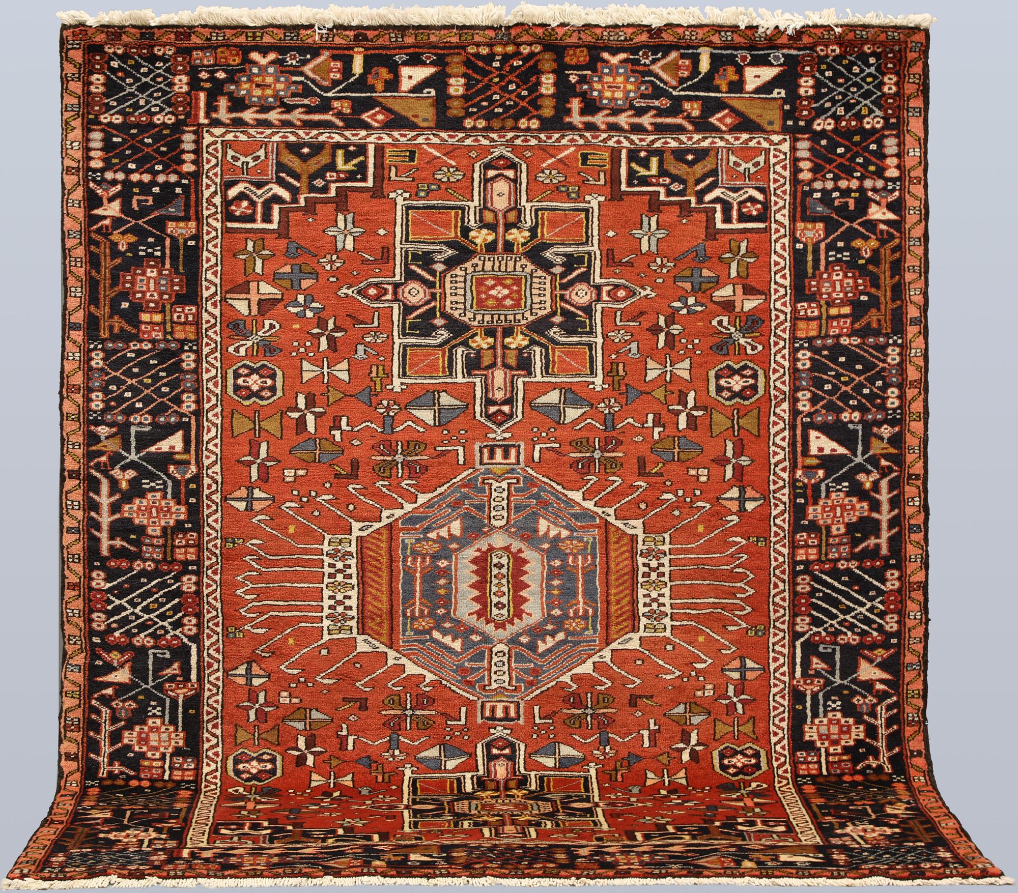 A Heris rug, approx. 191 x 157 cm.
