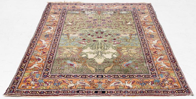 An antique Mobarekeh rug, central Persia, c. 230 x 130 cm.