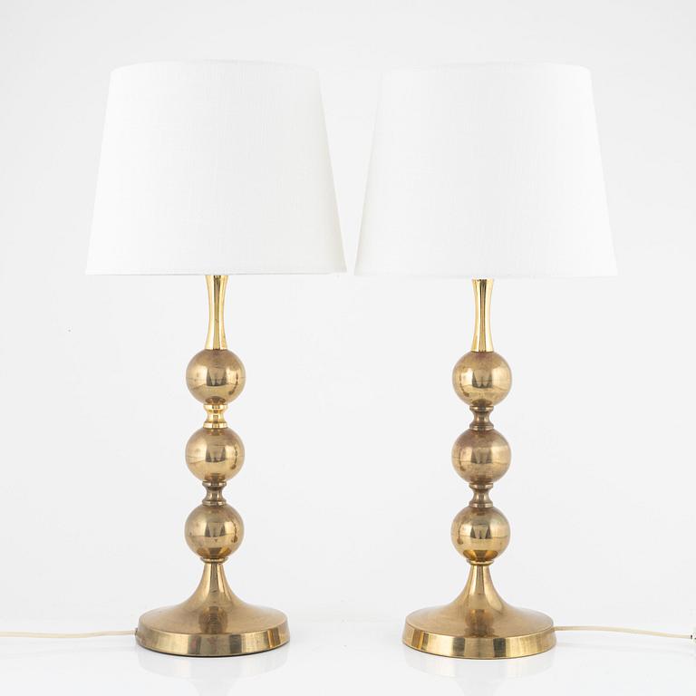 A pair of table lamps, yellow metal, second half of the 20th century.