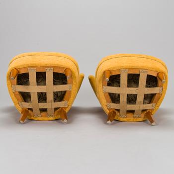 A pair of armchairs, mid-20th century.