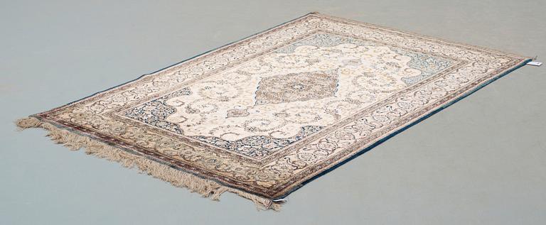 SEMI-ANTIQUE SILK KASHAN. 204,5 x 131,5 cm.